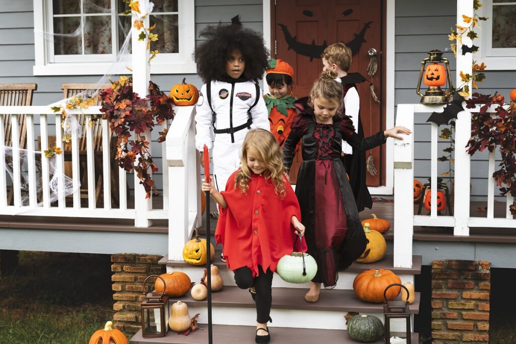 Young kids trick or treating during Halloween