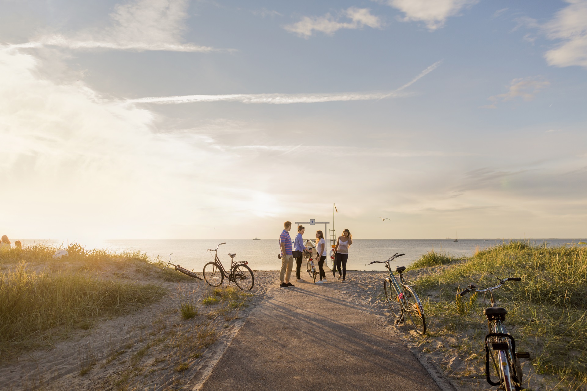 family biking on the beach - Thomas Beach Vacations, North Myrtle Beach